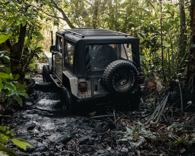 vagamon jeep off road image in a deep forest